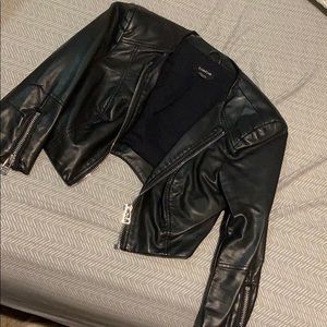 Bebe cropped, half sleeve leather jacket size xs
